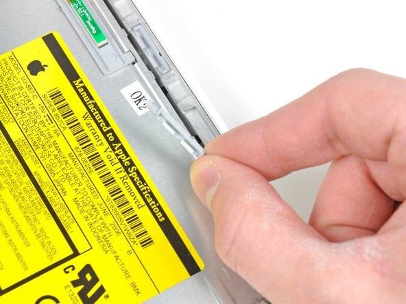 MacBook Core Duo Upper Case Clips Replacement: step 13, image 3 of 3