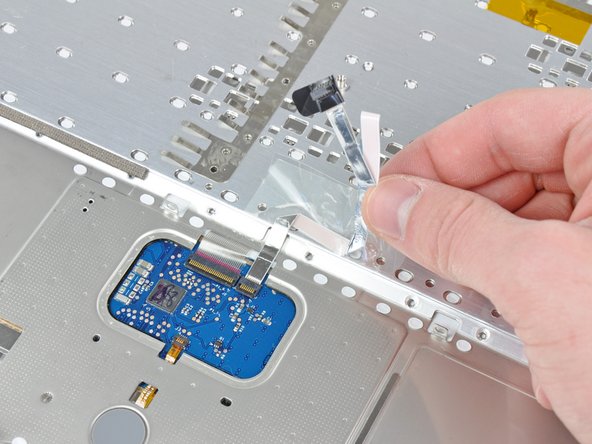 MacBook Core 2 Duo Upper Case Cable Replacement: step 23, image 1 of 1
