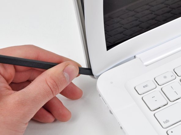 MacBook Unibody Model A1342 Front Display Bezel Replacement: step 4, image 1 of 2