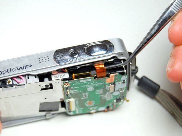 Pentax Optio WP Shutter and Power Buttons Replacement: step 7, image 3 of 3