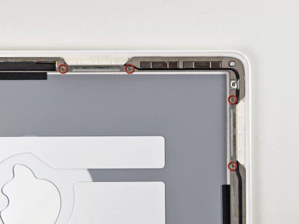 MacBook Unibody Model A1342 Rear Display Bezel Replacement: step 32, image 1 of 1