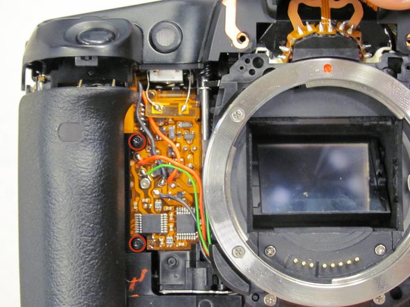 Canon EOS 30 Battery Door Replacement: step 15, image 1 of 1