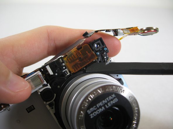 Disassembling Pentax Optio S4i Lens Assembly: step 22, image 1 of 2