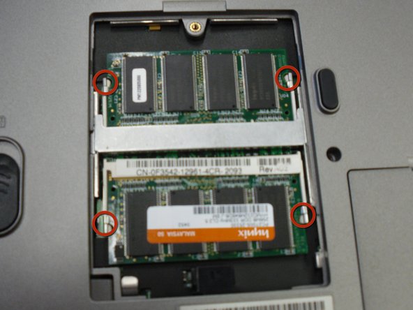 Removing Dell Inspiron 1150 RAM: step 3, image 1 of 3
