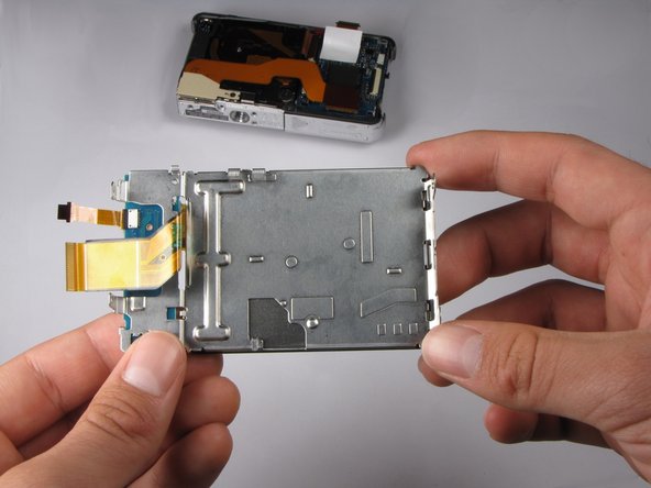 Repairing Sony Cyber-shot DSC-W290 Motherboard: step 14, image 1 of 1