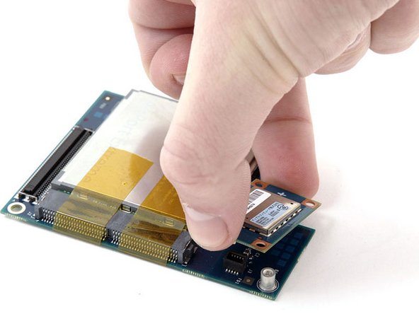 Mac mini (PowerPC) Wireless Interface Board Replacement: step 13, image 1 of 1