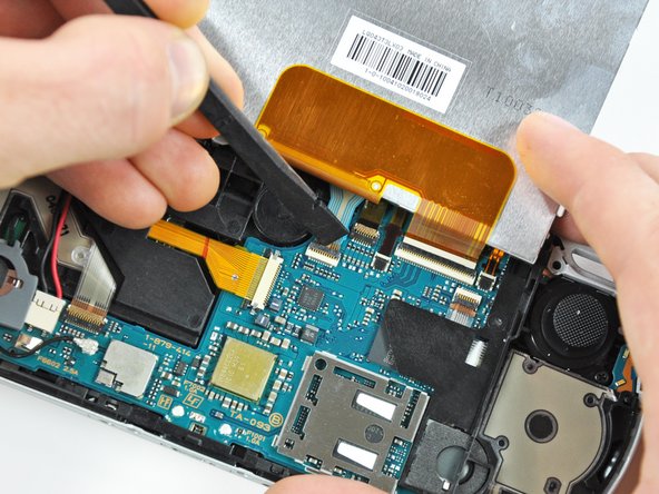 PSP 300xc UMD Brace Replacement: step 11, image 2 of 3