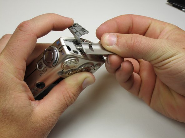 Canon Powershot SD550 Outer Case Replacement: step 3, image 2 of 3