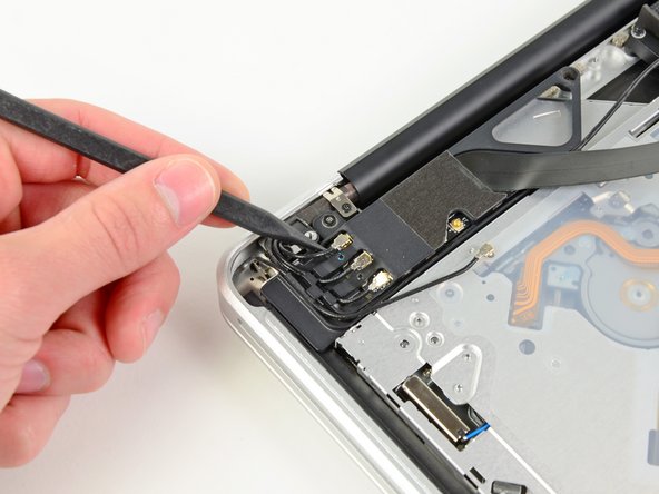 MacBook Pro 15" Unibody Early 2011 AirPort/Bluetooth Board Replacement: step 7, image 2 of 2