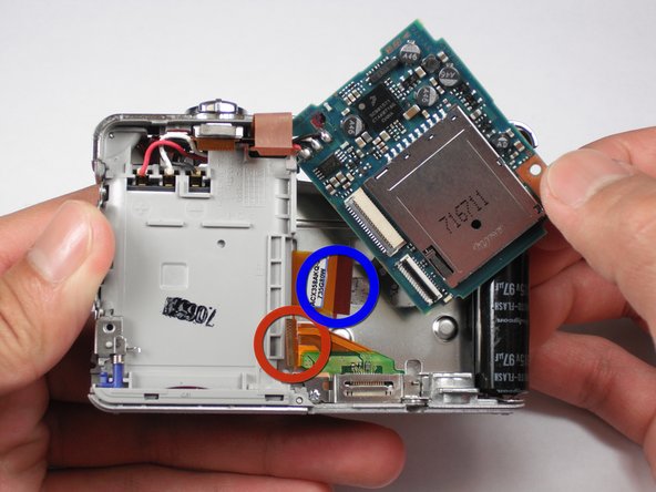 Sony Cyber-shot DSC-W55 Motherboard - First Half Replacement: step 13, image 1 of 2