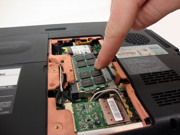 Toshiba Satellite M305D-S4829 RAM Replacement: step 4, image 1 of 1