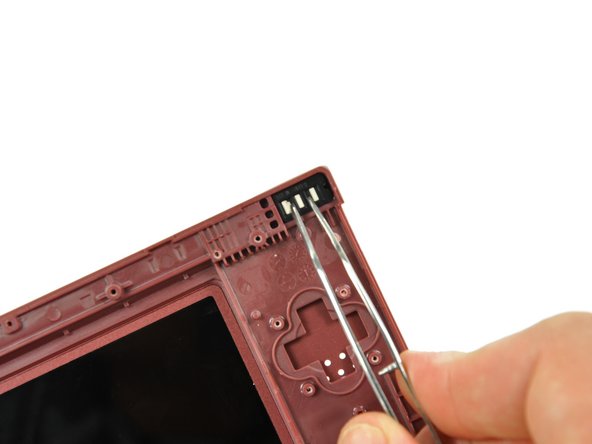 Nintendo DSi XL Camera Ribbon Replacement: step 37, image 1 of 2