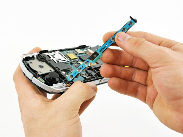 PSP 300xc UMD Door Replacement: step 13, image 1 of 3