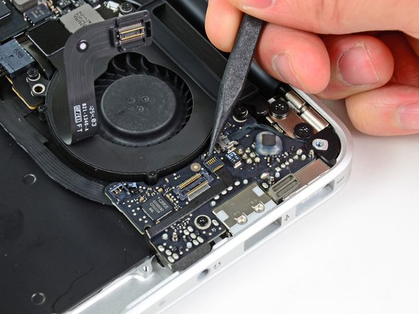 MacBook Air 11" Mid 2011 Microphone Replacement: step 11, image 1 of 2