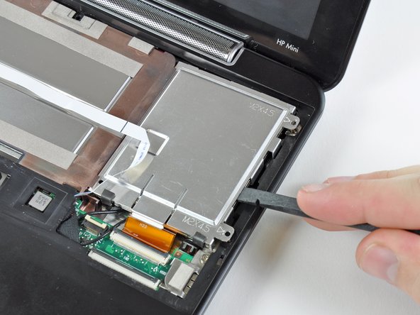 HP Mini 1000 PRAM Battery Replacement: step 10, image 1 of 2