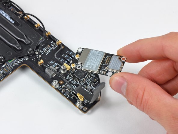 Mac Mini Mid 2010 AirPort/Bluetooth Board Replacement: step 26, image 1 of 1