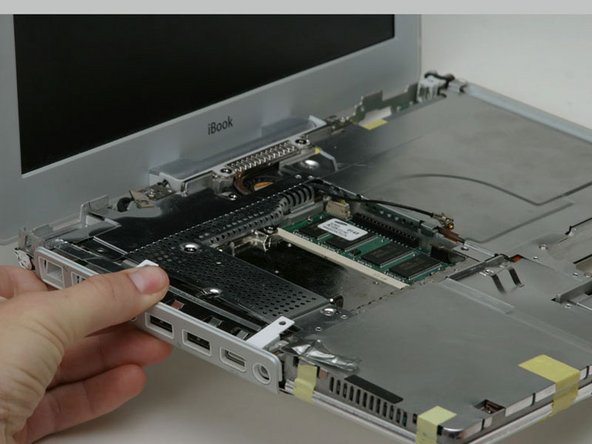 iBook G3 12" IO Bezel Replacement: step 36, image 1 of 1