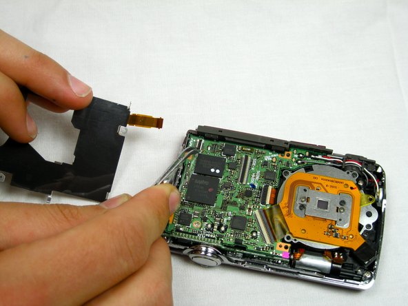 Nikon Coolpix S220 Lens Replacement: step 10, image 2 of 2