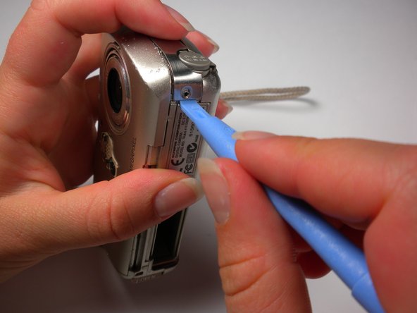 Olympus Stylus 410 Flash Replacement: step 6, image 1 of 2