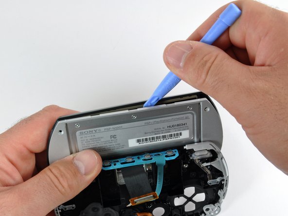 PSP Go Front Panel Replacement: step 18, image 2 of 3