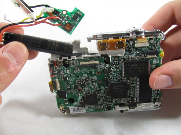 Removing Olympus FE-210 Flash Assembly: step 11, image 3 of 3