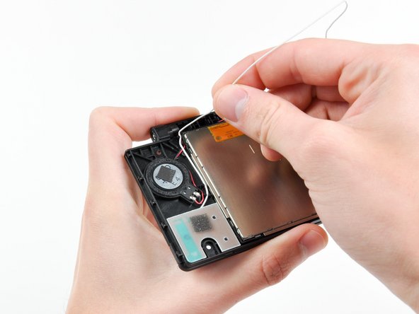 Nintendo DSi Upper LCD/Speakers Replacement: step 28, image 1 of 2