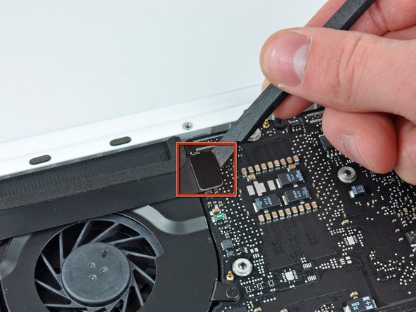 MacBook Unibody Model A1342 AirPort/Bluetooth Cable Replacement: step 4, image 1 of 2