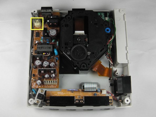 Sega Dreamcast Logic Board Removal: step 5, image 1 of 2