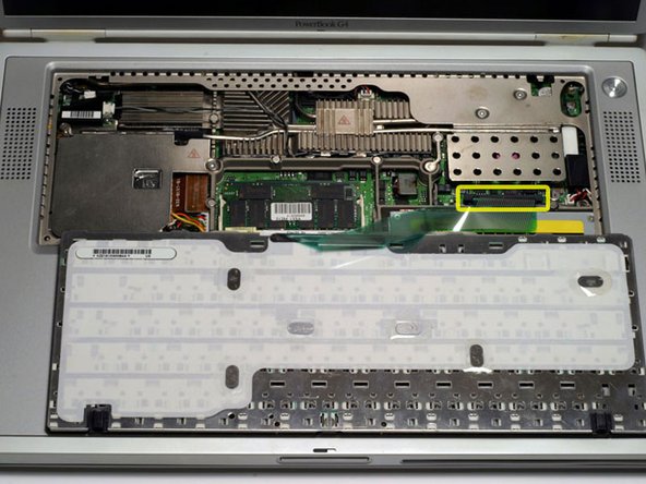 PowerBook G4 Titanium DVI PC Card Cage Replacement: step 3, image 1 of 1