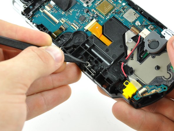 PSP 300xc UMD Brace Replacement: step 16, image 1 of 1