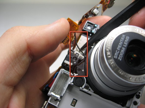 Disassembling Pentax Optio S4i Lens Assembly: step 23, image 1 of 3