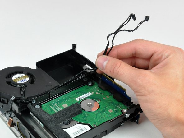 Mac mini Model A1176 Fan Replacement: step 16, image 1 of 1