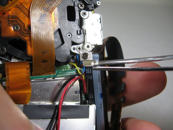 Disassembling Pentax Optio S4i Lens Assembly: step 28, image 2 of 3