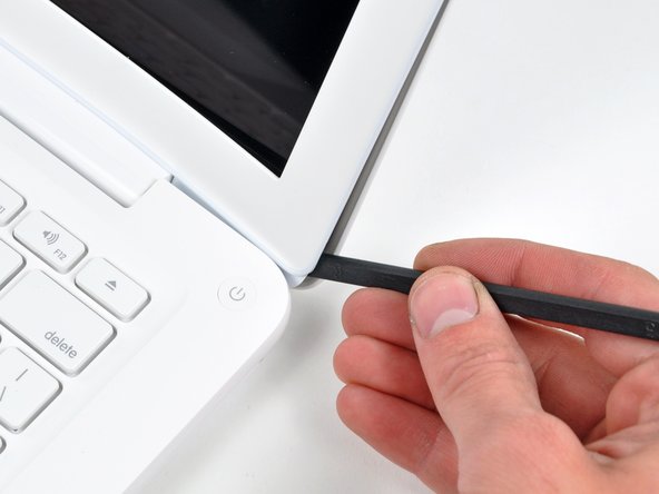 MacBook Unibody Model A1342 Front Display Bezel Replacement: step 4, image 2 of 2