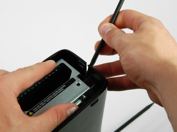 Xbox 360 S Faceplate Replacement: step 28, image 1 of 2