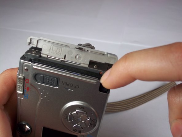 Canon PowerShot S230 Memory Card Replacement: step 2, image 2 of 3