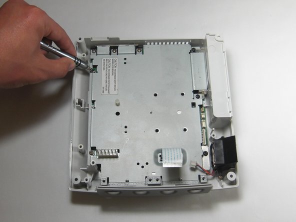 Sega Dreamcast Logic Board Removal: step 20, image 2 of 3