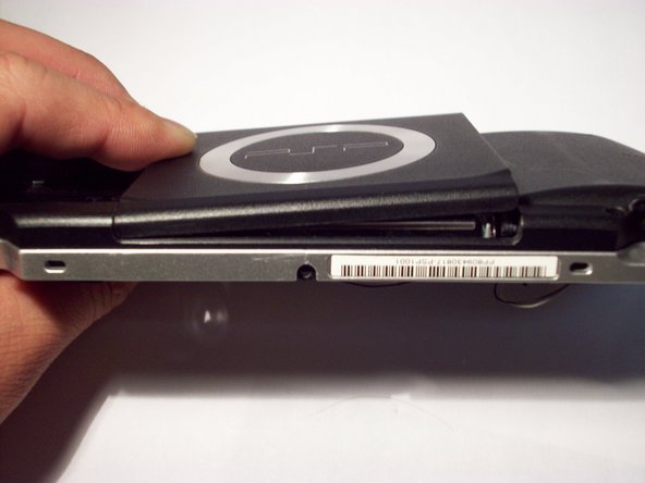 PSP 1000 UMD Door Replacement: step 18, image 1 of 2