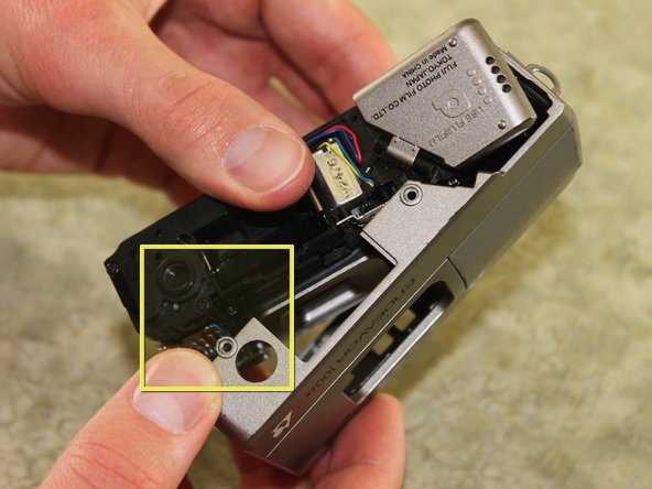 Disassembling Fujifilm Endeavor 100ix Outer Casing: step 11, image 1 of 2