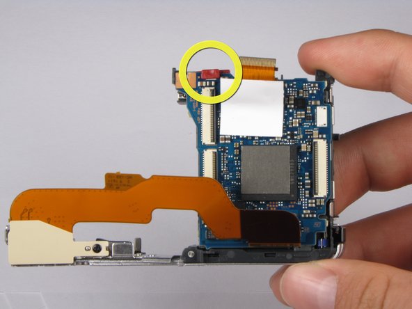 Repairing Sony Cyber-shot DSC-W290 Motherboard: step 21, image 1 of 3