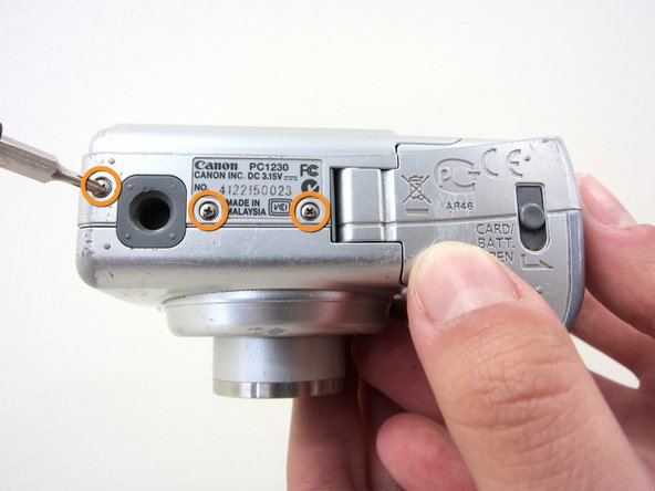 Removing Canon PowerShot A550 Front and Back Covers, Removing Canon PowerShot A550 Front and Back Covers: step 1, image 2 of 3