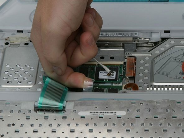 iBook G3 Clamshell Optical Drive Replacement: step 7, image 1 of 1