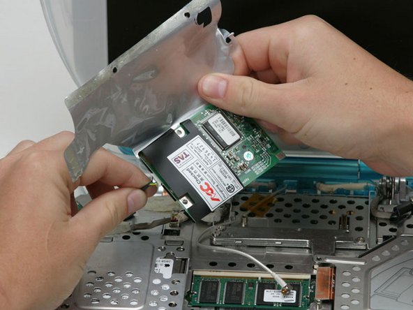 iBook G3 Clamshell DC-In Board Replacement: step 23, image 1 of 1