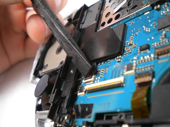 PSP 300xc Analog Stick Replacement: step 16, image 1 of 2