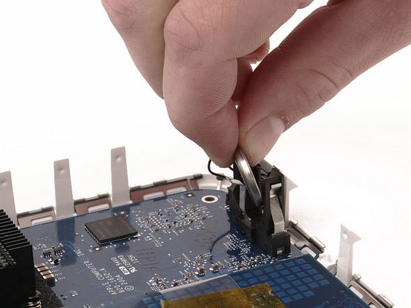 Mac mini (PowerPC) PRAM Battery Replacement: step 10, image 1 of 1