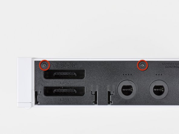 Nintendo Wii Bottom Panel Replacement: step 8, image 1 of 2