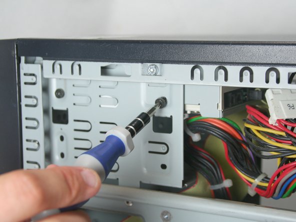 Removing the HP Compaq dx2000MT Optical (CD) Drive: step 7, image 2 of 2