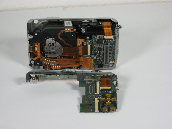 Panasonic Lumix DMC-TZ5 Button Board Replacement: step 10, image 2 of 2