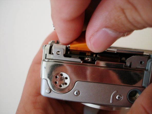 Sony Cyber-shot DSC-W5 Speaker Replacement: step 7, image 2 of 3