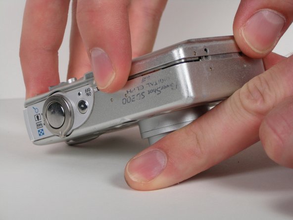 Canon PowerShot SD200 Buttons Replacement: step 5, image 1 of 2